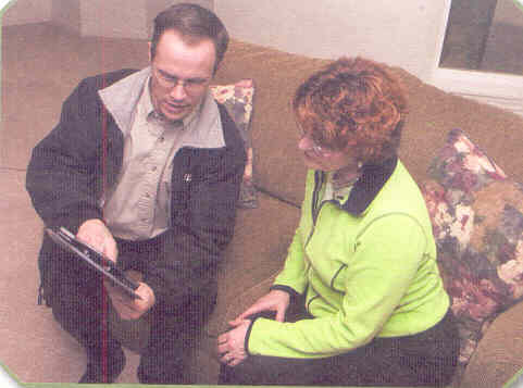 Consultant reviewing findings with a customer